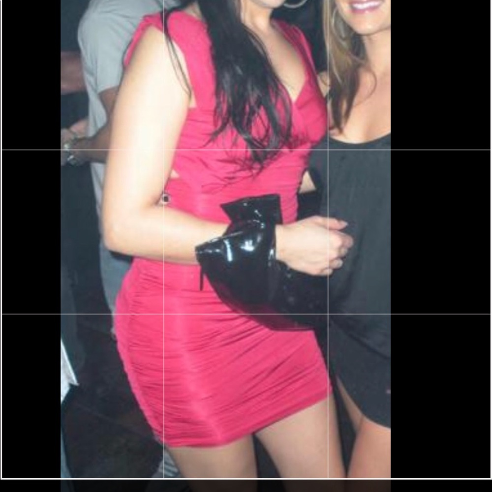 Red bebe backless dress.